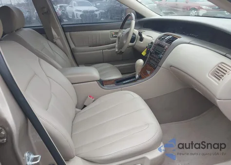 2004 Toyota Avalon Xls z USA, uszkodzony, nr VIN 4T1BF28BX4U341876